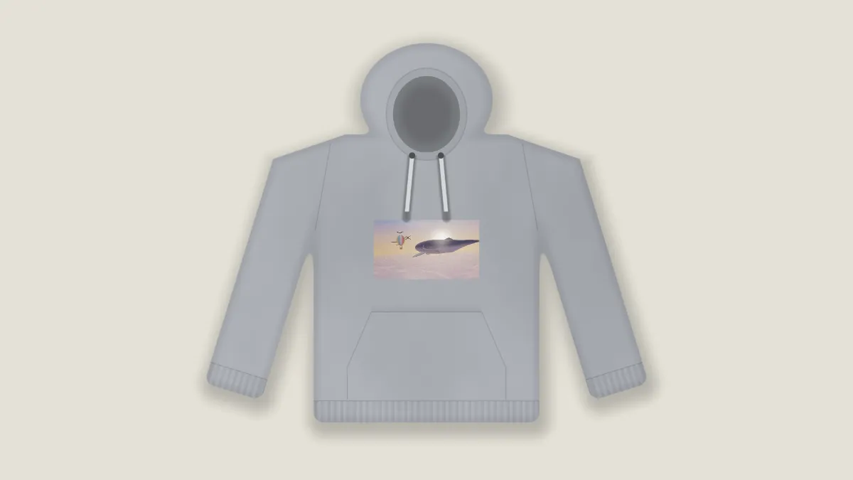 The whale picture printed on the chest of a gray flat-lay hoodie with drawstrings and a front pocket, on a beige backdrop
